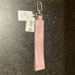 NWT lululemon never lost keychain pink peony- LMTD ED & COLOR NOT SOLD ANYMORE